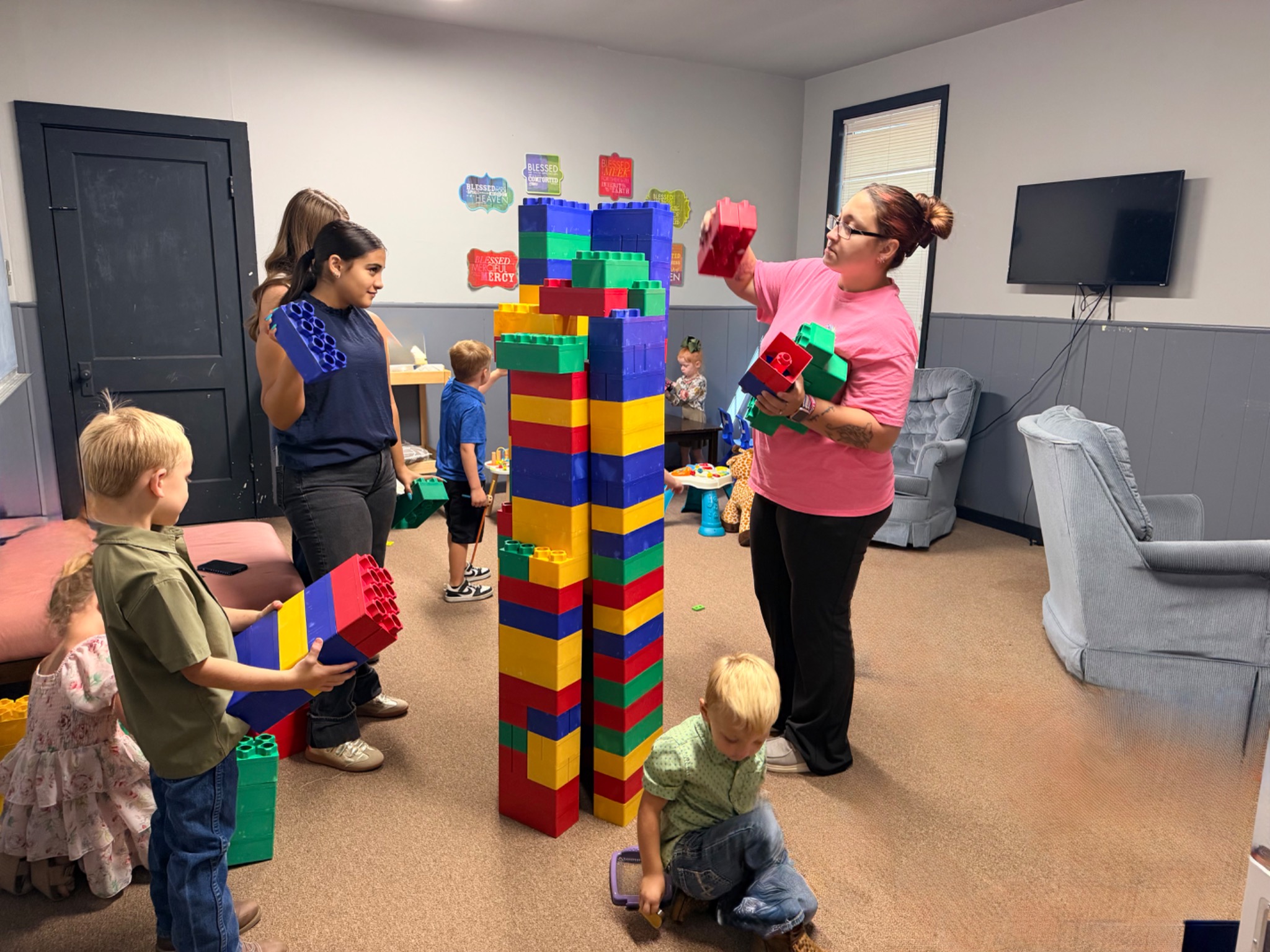 Children enjoying a building activity in Children’s Church